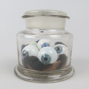 Glass eyes (human) in jar