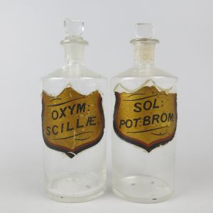 Vintage chemist bottles x 2